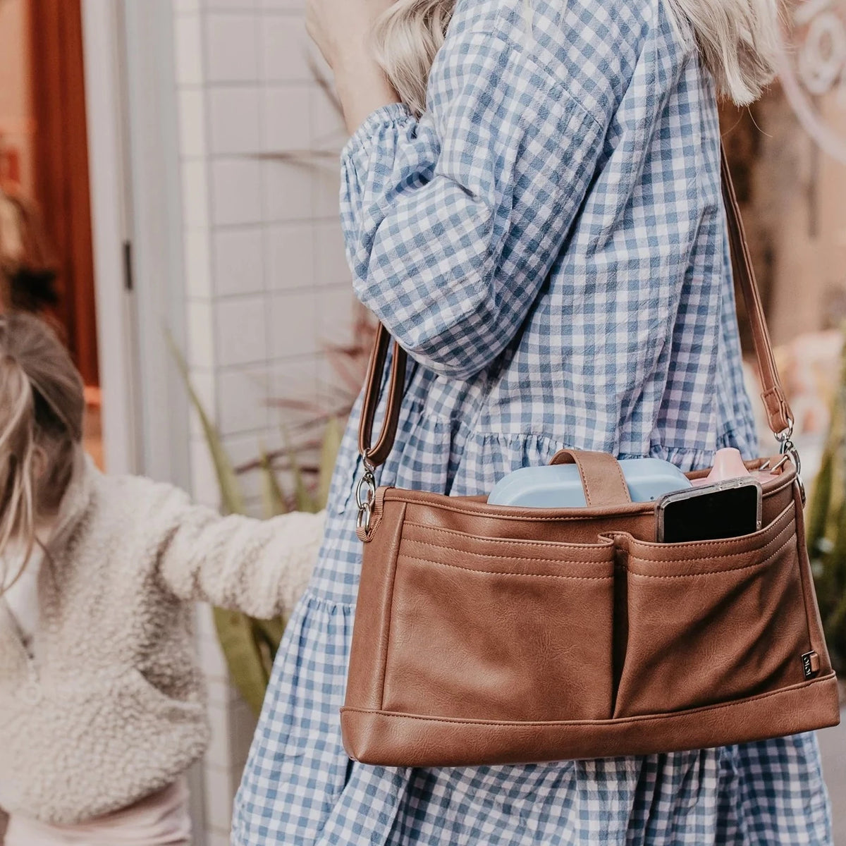 Tan store leather pram
